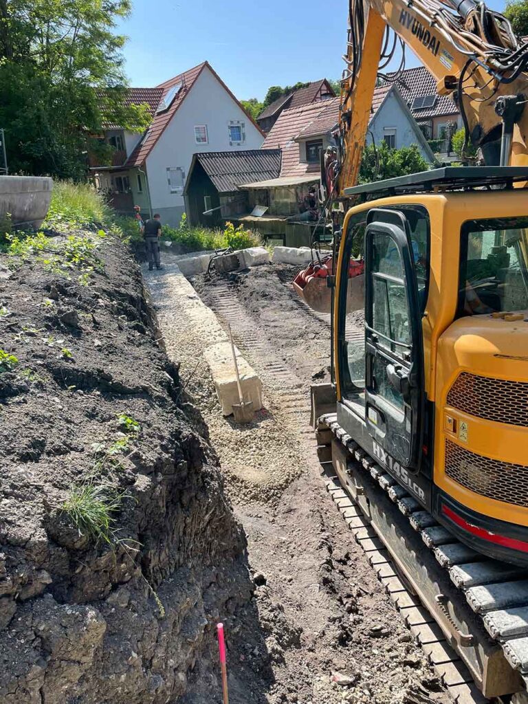 natursteinmauer gallmersgarten zwickbagger